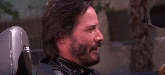 Keanu Reeves wink Gif