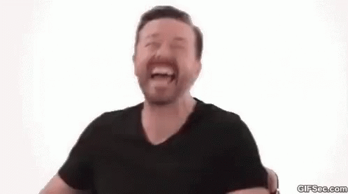 Ricky Gervais laugh gif